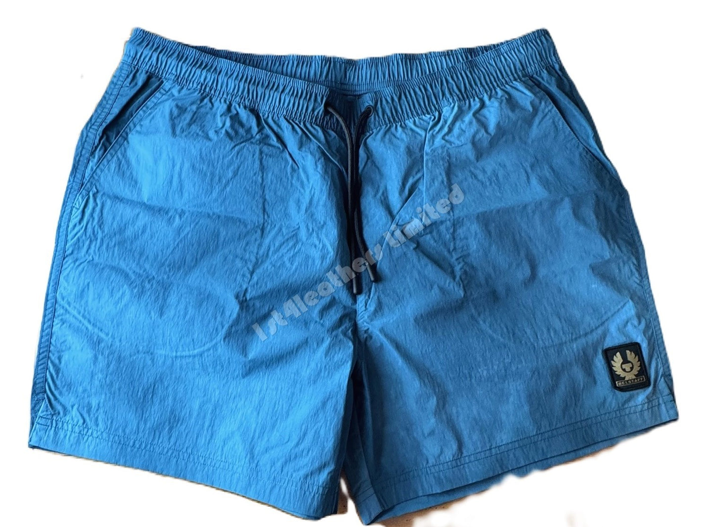 BELSTAFF BREAKER RIPPLE SHELL SHORTS IN WAVE DYE OCEAN BLUE RRP £175